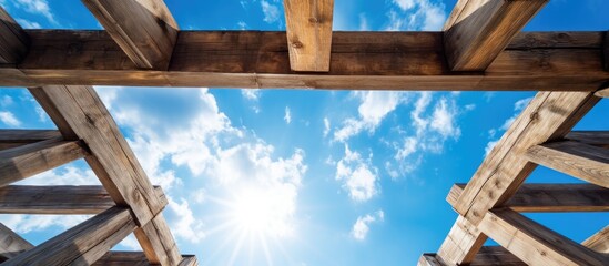 Fototapeta premium Rustic Wooden Pavilion under Blue Sky: Tranquil Outdoor Oasis in Nature