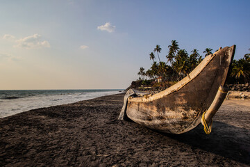 Fishing boat on the tropical beach in Varkala. Kerala. India
