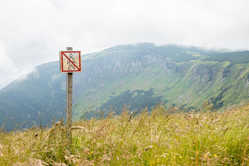a law prohibiting straying beyond the designated mountain trail