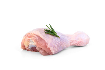 Raw chicken leg with rosemary isolated on white background.