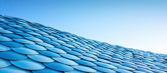 Glistening Blue Roof Covered with Many Reflective Metal Tiles