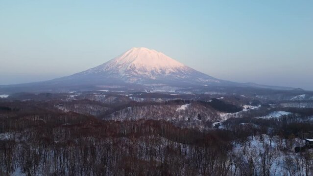 Niseko, Japan: Aerial drone footage of mount Yotei volcano near the Niseko ski resort the during winter in Hokkaido in northern Japan