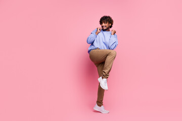 Photo of terrified scared man wear trendy clothes avoid monster look empty space isolated on pink...
