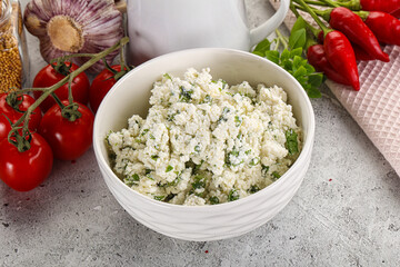 Curd cheese with green herbs