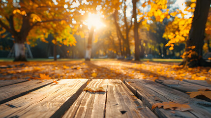 Naklejka na ściany i meble Empty wooden table in autumn park on sunny day ,