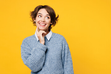 Young happy woman she wears grey knitted sweater shirt casual clothes put hand prop up on chin,...