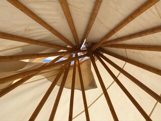 Inside a tent looking up 
