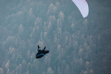 paragliding in the blue sky