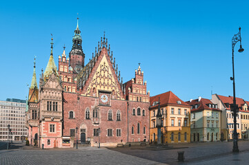Fototapeta na wymiar Market Square Old Town Cityscape of Wroclaw, Poland in Sunshine, Blue Skies Sky in Spring - Gothic Architecture
