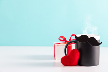 Happy Father's Day. Black mug with steam, tea, coffee, paper mustache, red heart, gift box, bow tie...