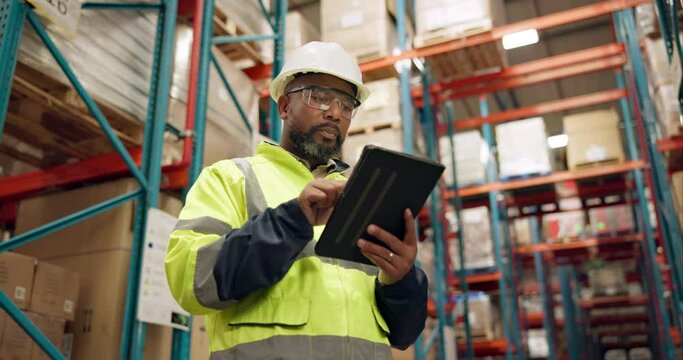 Distribution, warehouse and black man on tablet for inspection, inventory and online stock. Manufacturing, supply chain and person on digital tech for logistics, maintenance and shipping in factory