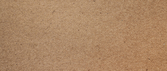 Fototapeta na wymiar brown kraft paper or cardboard texture, old paper sheet for background, beige rough carton, parchment or papyrus.