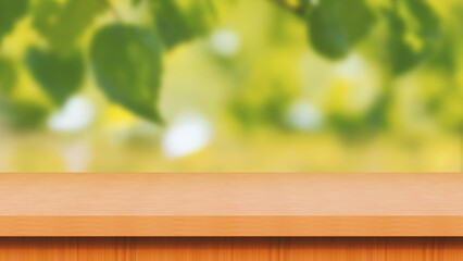 Wooden table concept. Empty wooden table with defocused green lush foliage at background.