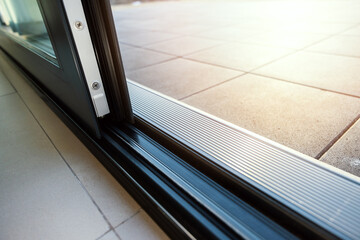 closeup of aluminium frame sliding terrace door system - obrazy, fototapety, plakaty