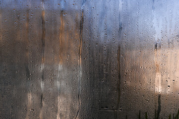 wet window glass with water droplets. background.