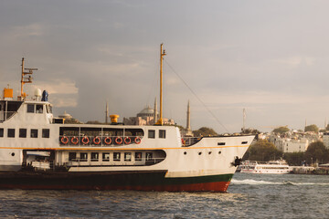 Fototapeta premium Istanbul background photo. Ferry and Hagia Sophia on the background