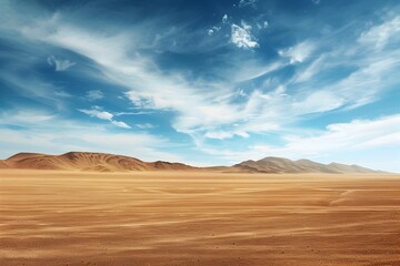 Fototapeta na wymiar Brown desert landscape with mountains under blue sky, To convey a sense of vastness and aridness in a visually appealing way, suitable for travel,