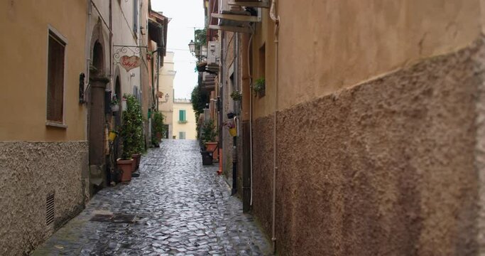 Exploring Italy's Charming Village Life: Flower-filled Streets and Architecture. High quality 4k footage