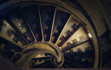 Ancient spiral staircase. Dark and gloomy.