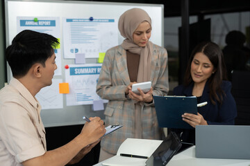 Business team present. professional investor working new start up project. Finance managers meeting.using smart phone and laptop and digital tablet computer in modern office.
