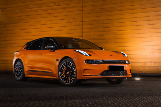 orange sports car Zeekr 001 modern Electric car