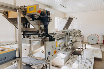 Honeycomb frames in extraction plant at beekeeping factory
