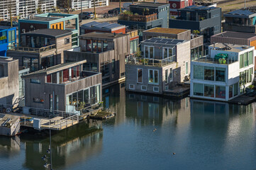 Fototapeta na wymiar Floating houses at Ijburg neighbourhood in Amsterdam-Oost