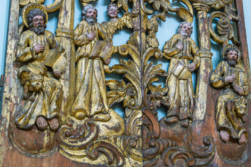 Perm wooden sculpture. Decorations from the temple. Carved saints made of wood. Ancient sculptures in the church. A place for the priest to pray. Ancient masterpieces of wooden architecture.