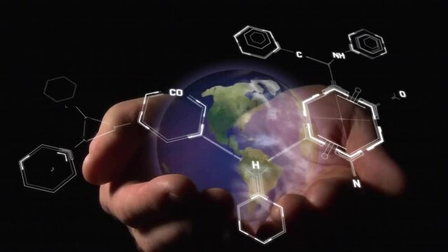 Animation of scientific data processing and globe ove caucasian man's hands