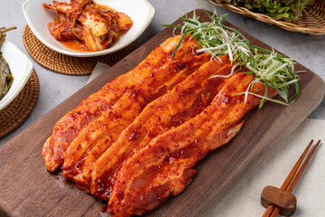Korean food, briquettes, bulgogi, red pepper paste, pork, pork belly, side dishes, garlic, lettuce, vegetables, seasoning