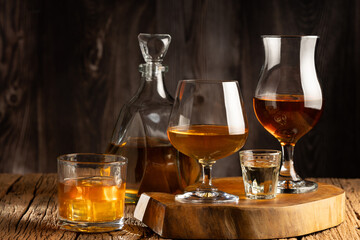 Selection of strong alcoholic drinks. Whiskey, liqueur, tequila, cognac, rum.