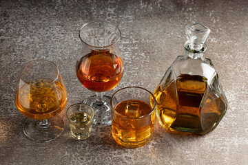 Selection of strong alcoholic drinks. Whiskey, liqueur, tequila, cognac, rum.