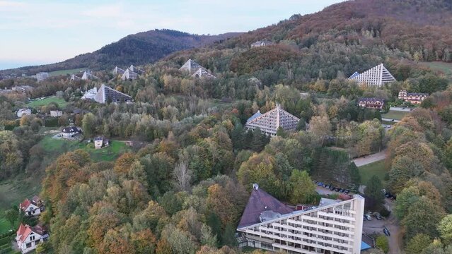 Scenery of the town and health resort in Ustron on the hills of the Silesian Beskids, Poland. Aerial drone view of beskid mountains in Ustron. Ustron Aerial View.