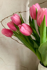 bouquet of pink tulips in vase