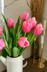 bouquet of pink tulips in vase