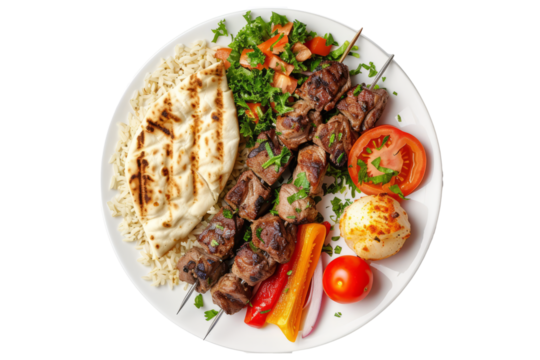 top view of Adana kebab, a Turkish dish featuring minced lamb or beef skewers, served with grilled vegetables, rice, and flatbread.