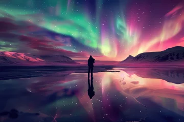 Photo sur Plexiglas Aurores boréales A person stands silhouetted against a backdrop blending the beach and moon under a sky lit by the sunset, night, and aurora borealis