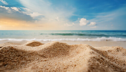 Fototapeta na wymiar Close up sand with blurred sea sky background, summer day, copy space or for product. Summer