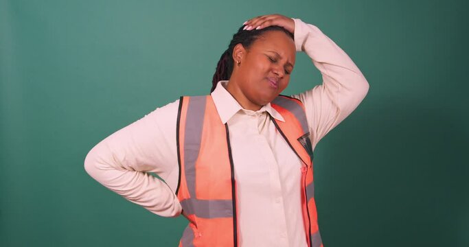 Young Black manager experiencing backache pain on construction site