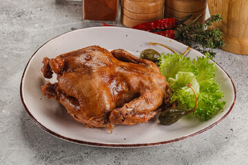 Baked small chicken with spices