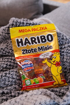 a bag of haribo candy sitting on the couch in a living room