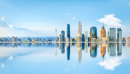 City commercial buildings skyline and water reflection in Guangzhou