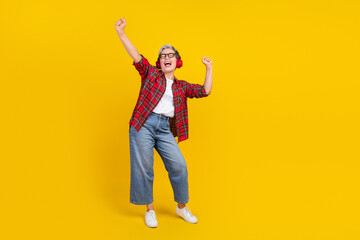Full size photo of crazy positive aged lady raise fists dance enjoy favorite song empty space...