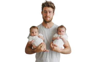 Father proud of his newborn twin babies