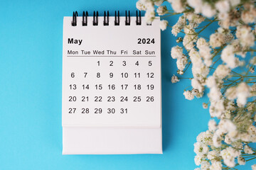 May 2024 calendar flat lay on blue background - obrazy, fototapety, plakaty