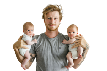 Father proud of his newborn twin babies