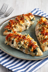 Homemade Hasselback Chicken on a Plate, side view.