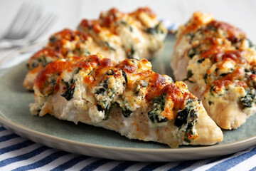 Homemade Hasselback Chicken on a Plate, side view.