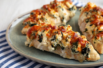Homemade Hasselback Chicken on a Plate, side view. Close-up.
