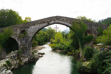 Fototapeta na wymiar Roman bridge of Cangas de Onis over the river Sella. Asturias - Spain